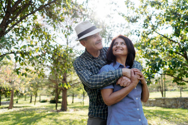 Cheerful elderly couple share an affectionate moment