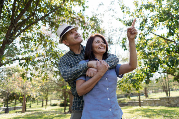 istock Elderly couple pauses to admire the birds 1974020563
