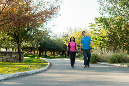 Making their morning ritual a priority, the elderly couple sets out for their daily park walk, embracing the opportunity to start each day with movement, vitality, and love.