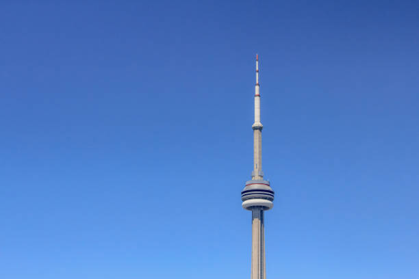 Toronto, Ontario, Canada. Jan 30, 2024.  The CN Tower stands prominently amidst clear summer skies.
