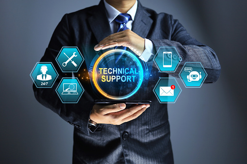 technical support concept with businessman holding a customer service information icon after sale service such as repair, newsletter e-mail, question and answer, on site services 24 hour in 7 day