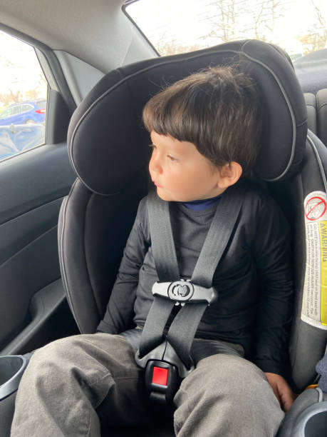 istock Boy sitting in car seat 1974104995