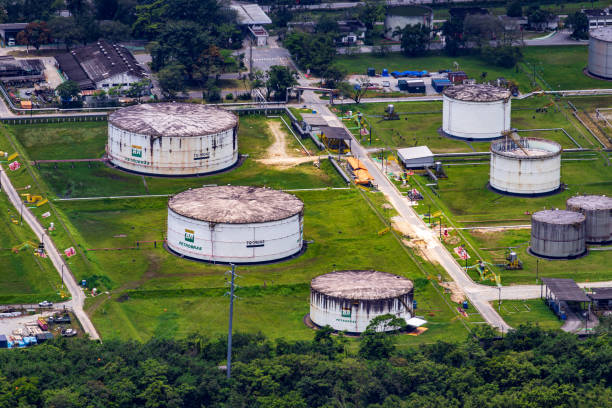 Aerial View of Oil Storage Tanks at Facility in Cubatão, Brazil. Cubatao, Sao Paulo, Brazil - November 20, 2022: Aerial View of Oil Storage Tanks at Facility in Cubatão, Brazil. cubatão stock pictures, royalty-free photos & images