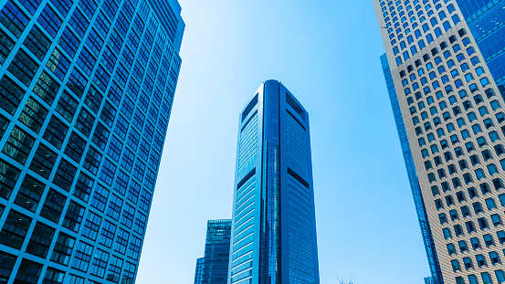 Modern office buildings in financial district in Paris, however the image is taken from angle that looks generic location