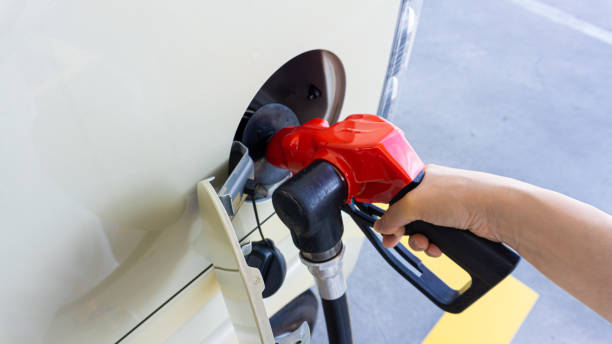istock Filling up with gasoline at a gas station 1974184376