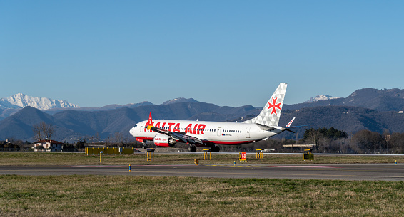Bergamo, Italy. A Ryanair Boeing 737 MAX 8 is landing at the Bergamo Milano International Airport