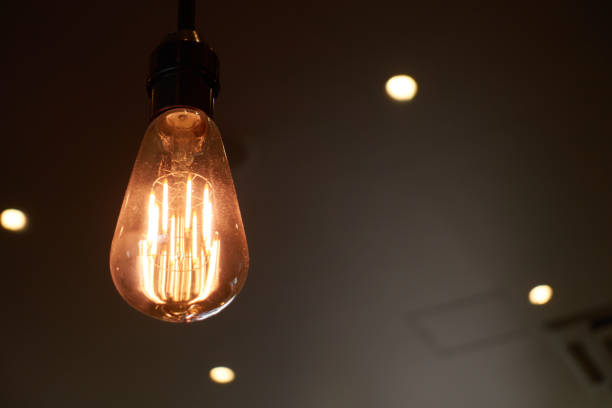 A filament light bulb that glows warmly