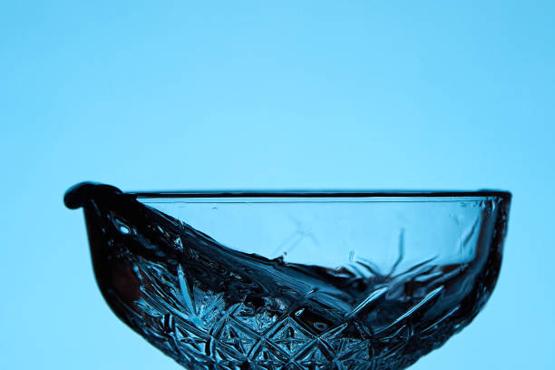 Splash Of Water Over Blue Background