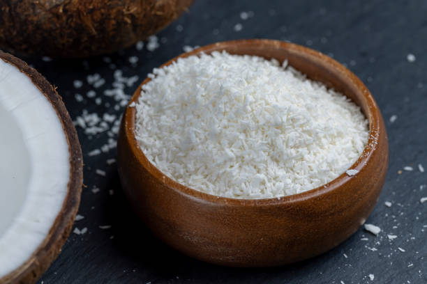 istock dry white coconut chips for adding to desserts 1974410463