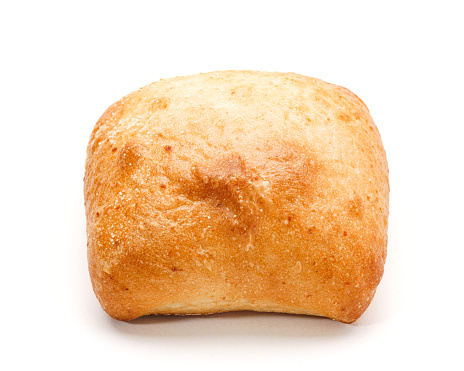 Baked loaf of bread with beautiful cut crust
