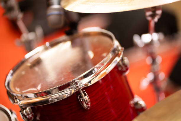 istock Complete set of red drums in studio, bokeh light background 1974523762