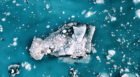 Small icebergs broken off from the large glacier at Vatnajökull, Iceland. Image was taken with a drone.