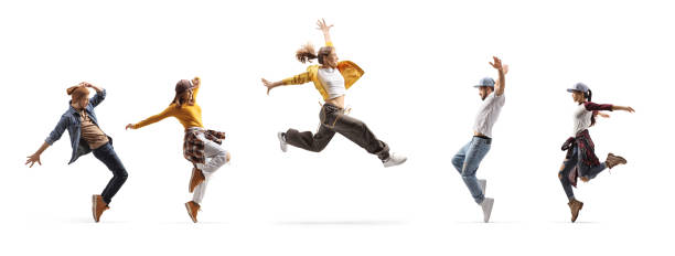 istock Group of casual young people dancing 1974546179