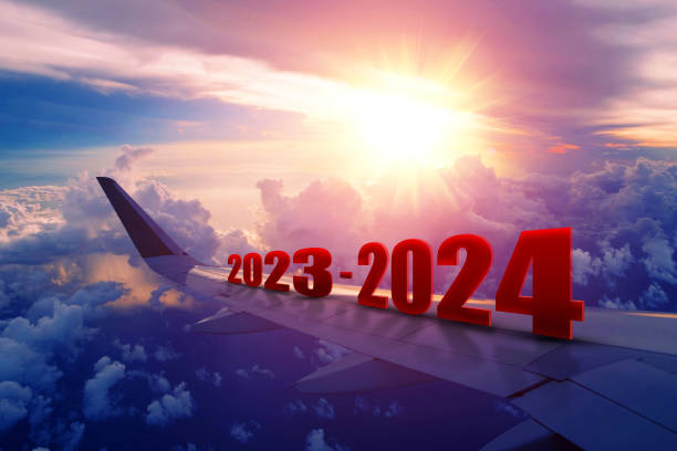 istock Airplane wing flying at sunrise in 2023-2024 1974577147