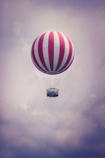 istock Hot Air Balloon Beyond The Clouds 1974591974
