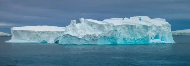 Photo of Accumulation of stranded icebergs on the shores of Paradise Bay, Gerlach Straight, Antarctica