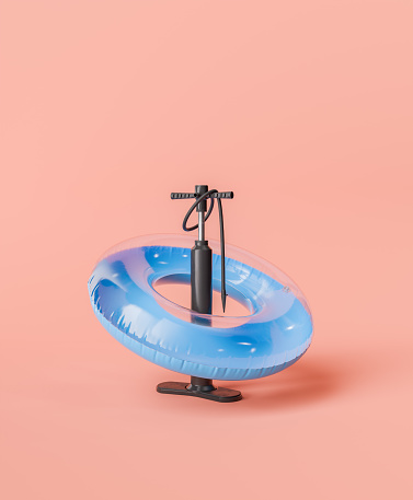 3d rendering of a blue inflatable pool ring with a black air pump against a pastel pink background. Summer preparation concept.