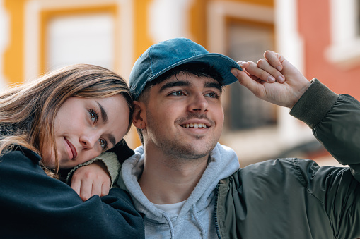 boy and girl couple on the street outdoors