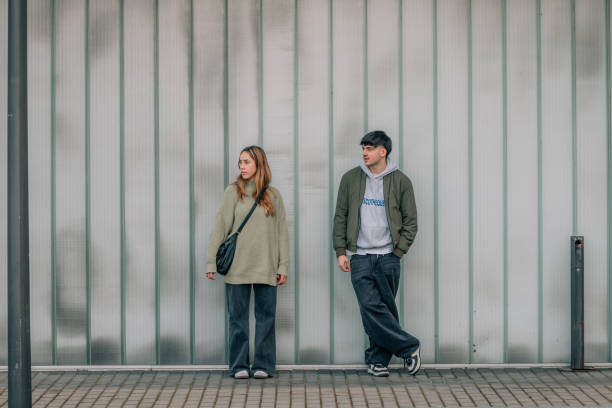 istock urban young couple on the street 1974657821