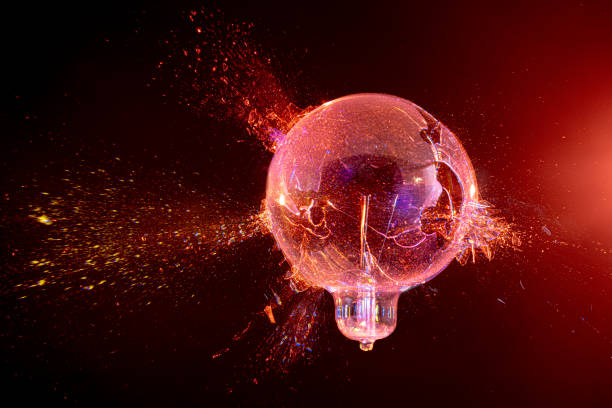 istock explosion of a glass bulb on a black background. 1974680851