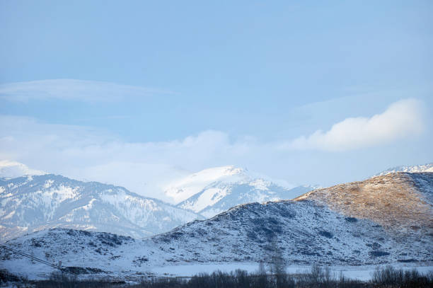 istock Cold snowy mountain landscape at sunset. 1974736748