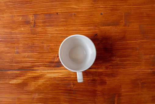 white coffee cup on the table