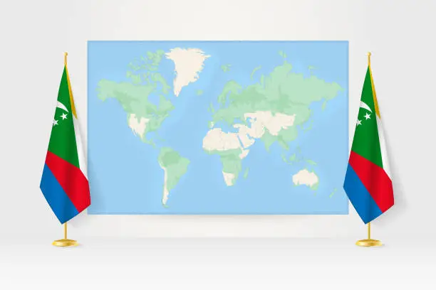 Vector illustration of World Map between two hanging flags of Comoros flag stand.