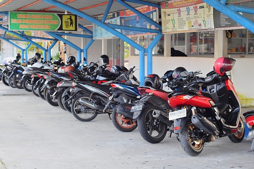 Riau-Indonesia, January 31th 2024 : motorbike parking area in front of Bengkalis prison
