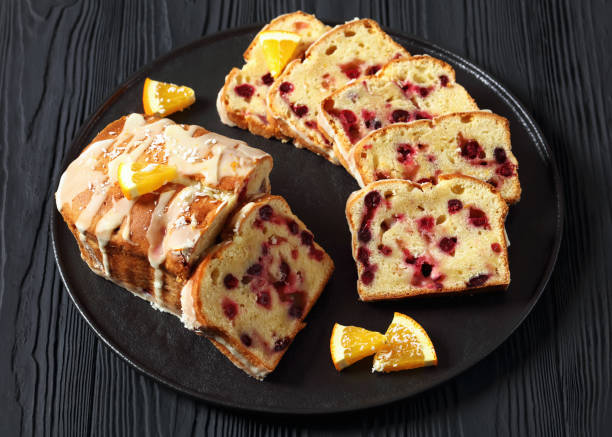 istock orange cranberry loaf with orange glaze, top view 1974839180