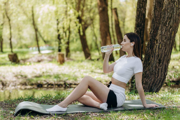 istock woman drink water after sport 1974842841