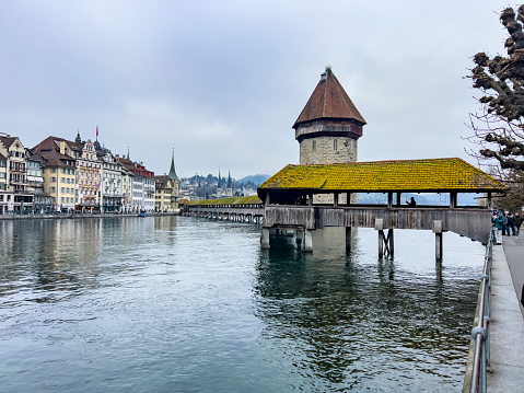 The Kapell Bridge (Kapellbrücke) is one of the most famous monuments in Lucerne. The wooden bridge and the stone water tower are still intact today. This pedestrian bridge connect two sides of city.