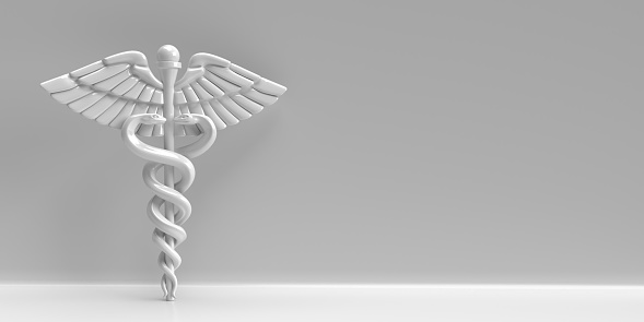 Healthcare and medicine concept. Caduceus is ancient symbol of medicine and health science. 3D rendered, white color caduceus symbol on gray background. Large copy space. Thanks to clipping path feature, background can change or crop object easly.