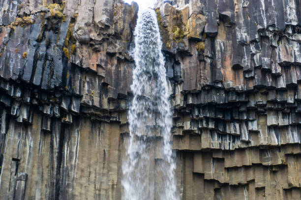 Svartifoss waterfall with basalt columns in Skaftafell national park in Iceland stock photo
