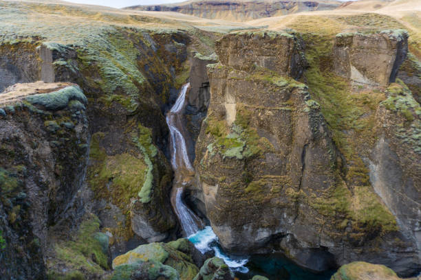 Waterfall in Fjadrargljufur canyon nature area in Iceland stock photo