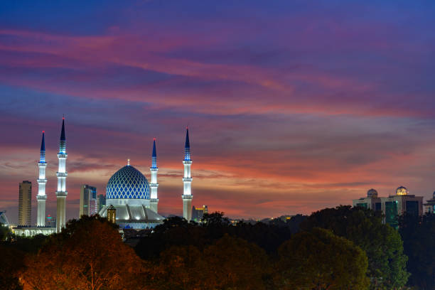 istock Light up Blue mosque with colorful sunset during blue hour 1974924219