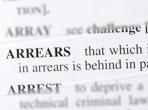 close up photo of the word arrears