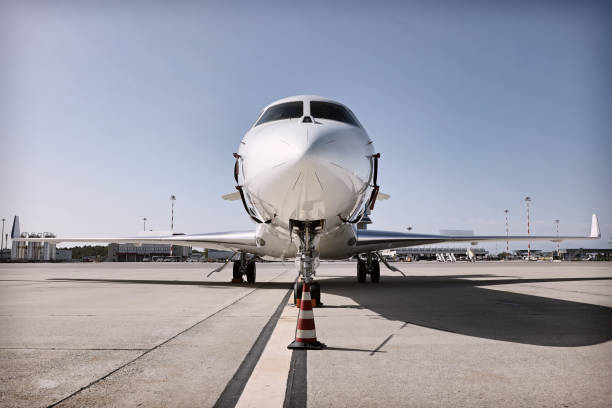 istock Business jet at airport 1974990778