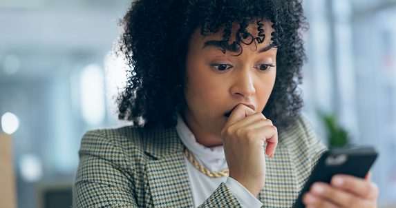 Woman, phone and night in office for stress, error or reading for problem solving for communication. Entrepreneur, smartphone and 404 glitch for networking, mobile app or frustrated face in workplace