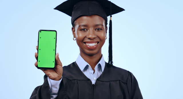 Graduation, woman and phone green screen for college marketing, contact or registration on blue background. Face of african student or graduate with mobile mockup, e learning and education in studio