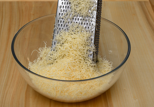 Yellow Gouda cheese, grated on small holes