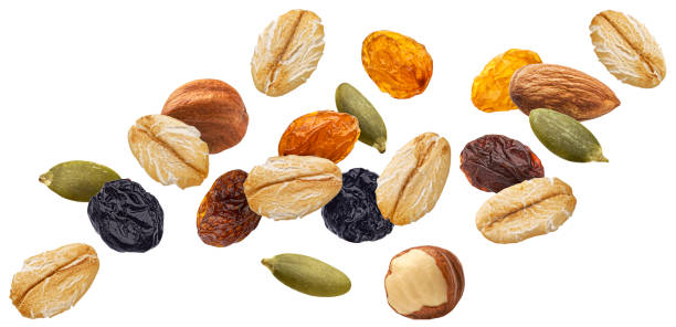 istock Falling muesli, oat granola isolated on white background 1975096322