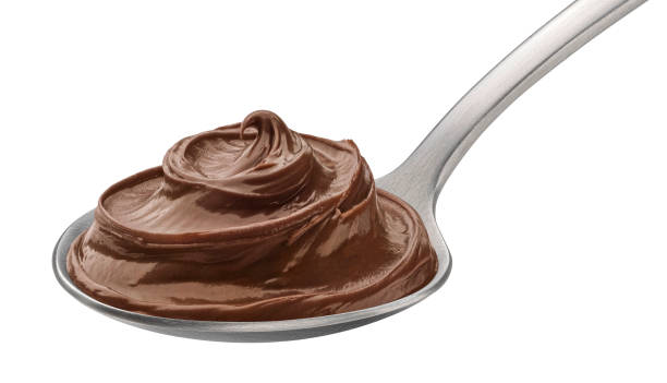 istock Hazelnut cream in spoon isolated on white background 1975097976
