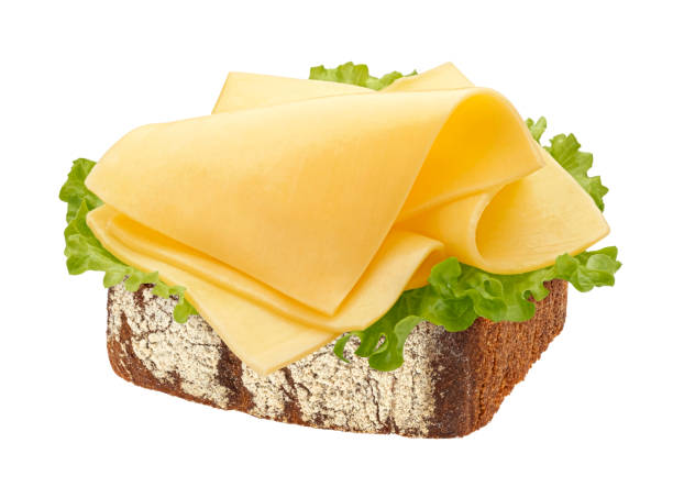 istock Gouda slices on rye bread isolated on white background 1975098518