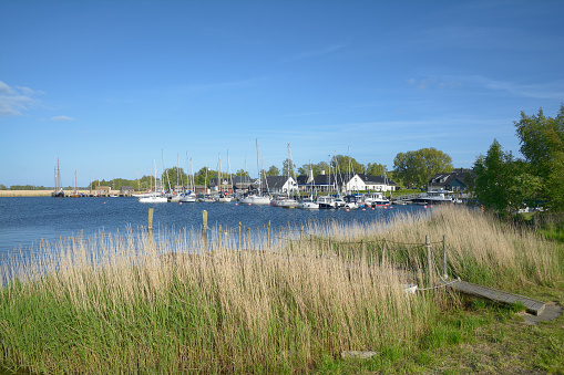 Warnemunde city with marina, lighthouse and building called teapot