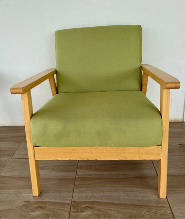 A chair that looks like a sofa But I can sit alone. And it has an armrest too.