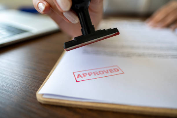 istock Putting Stamp Of Approval 1975120807
