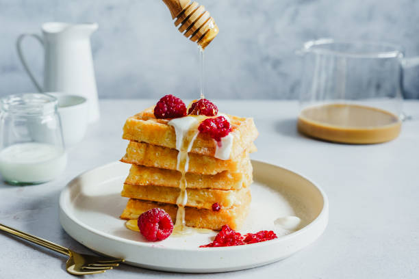 istock Still life of fresh waffles with honey 1975138658