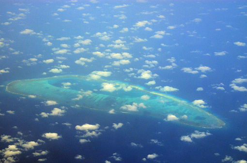 Lakshadweep Union Territory, India: Cherbaniani Reef, aka Beleapani Reef (Malayalam: Valiyapanniyam), coral atoll in the Amindivi islands group - coral reef that encloses the lagoon with three small islands, there is a mosque in the north island - aerial view - Laccadive Sea.