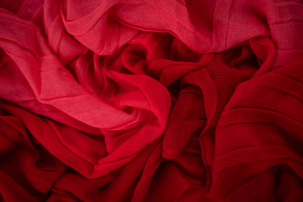 istock Dark and light red colour fabric background 1975157843