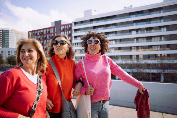 istock Friends walking in the city 1975163034